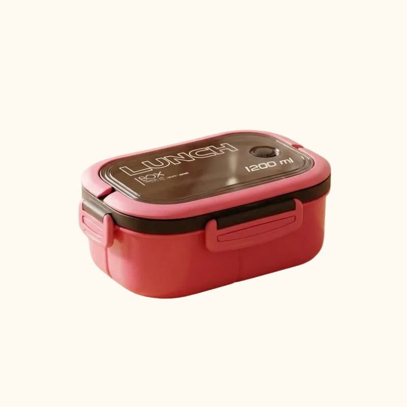 Contemporary pink bento box lunch japanese box with dual compartments and side handles isolated on clean white background for clear product viewing