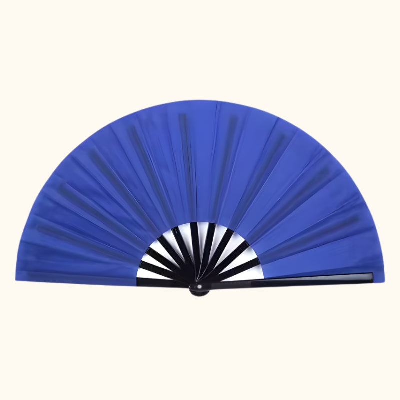 Classic big blue japanese fan with black bamboo ribs and white accent displayed on neutral background showing elegant traditional design