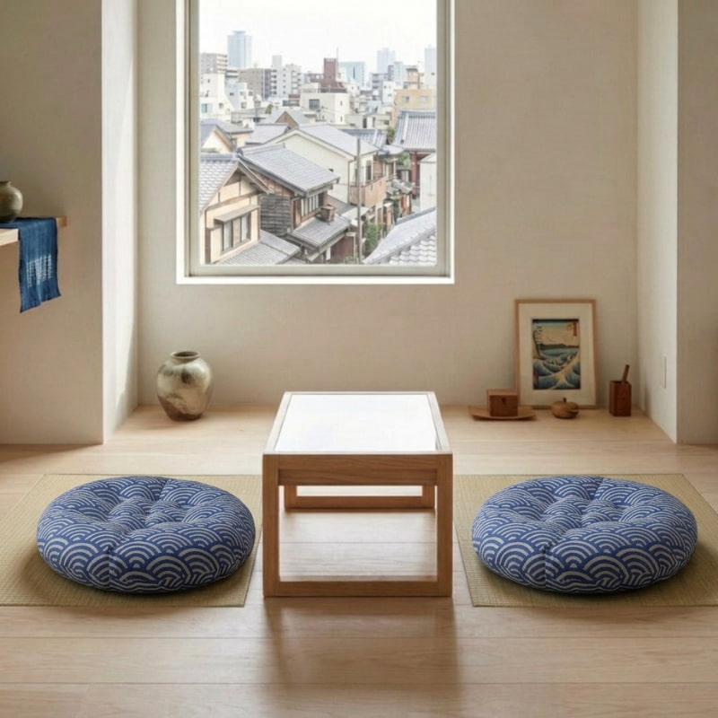 Placed on either side of a low table with a city view, these cushions in Japanese style show a blue wave pattern