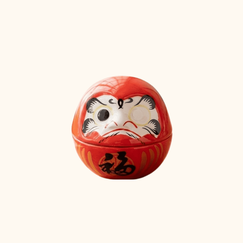 Daruma art japanese featuring bright red coloring and expressive calligraphy with prosperity kanji on clean white background