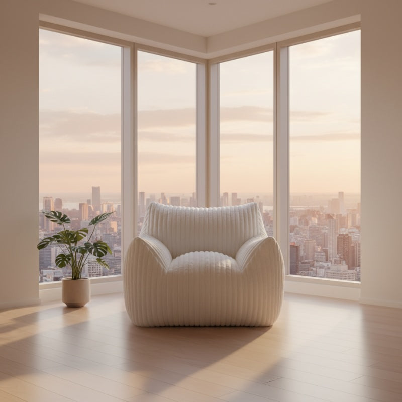 Floor japanese sofa armchair style with white ribbed upholstery and integrated armrests on neutral background