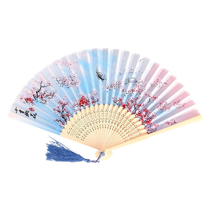 Delicate japanese hand fan vintage design featuring blue to pink gradient with cherry blossoms birds and natural bamboo ribs displayed flat
