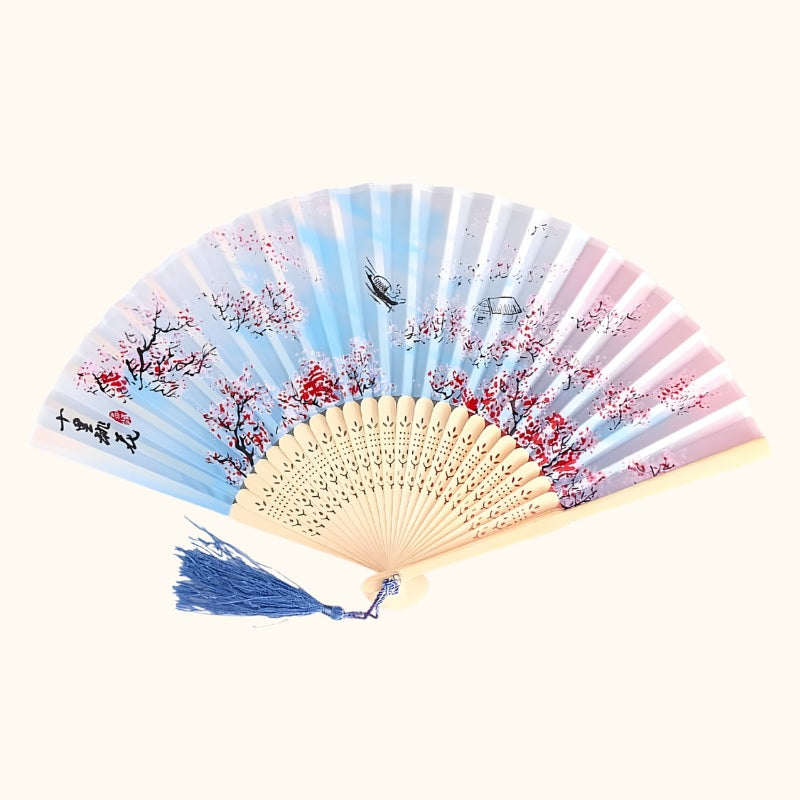 Delicate japanese hand fan vintage design featuring blue to pink gradient with cherry blossoms birds and natural bamboo ribs displayed flat