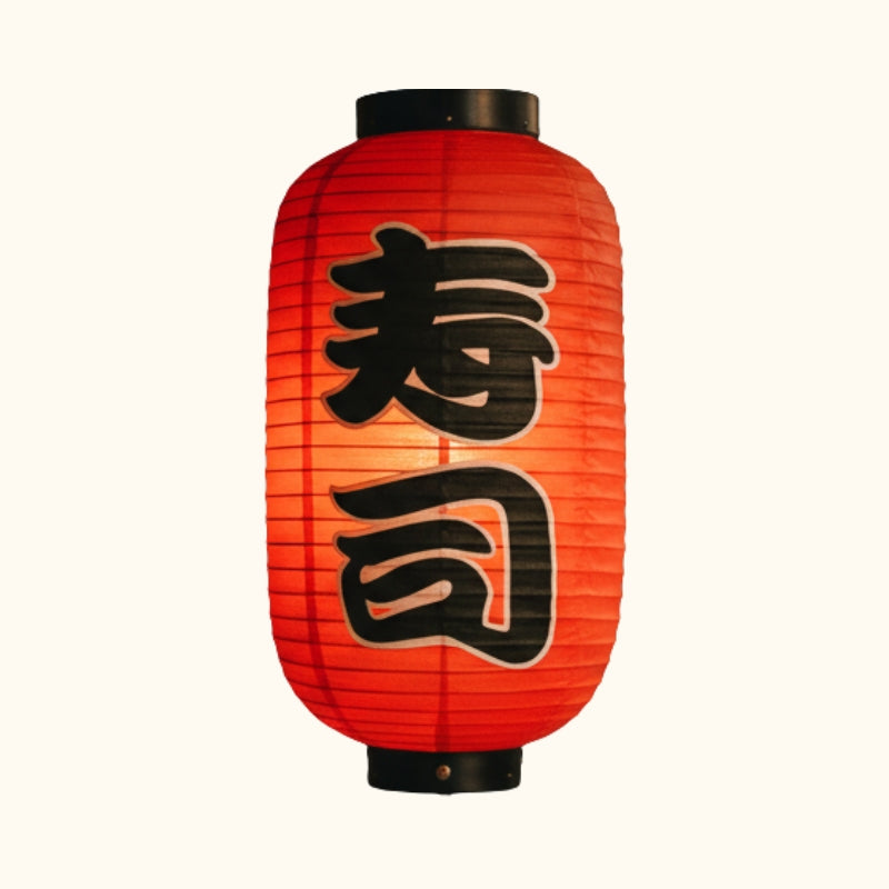 Classic japanese lantern floating paper featuring bold sushi kanji calligraphy in red and black displayed on clean white background