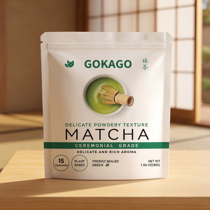 GOKAGO Japanese matcha powder in a 30g ceremonial grade pouch, displayed on a wooden table in a traditional Japanese room.