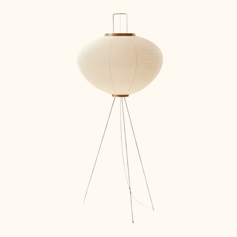 Classic lamp floor wabi sabi featuring oval rice paper shade with horizontal ribbing on slender tripod base displayed on white background