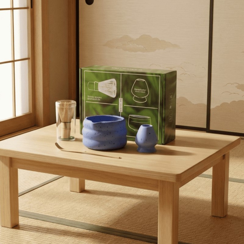 Deep blue matcha tea whisk set japanese style with bamboo accessories displayed on low wooden table in traditional tatami room with mountain art