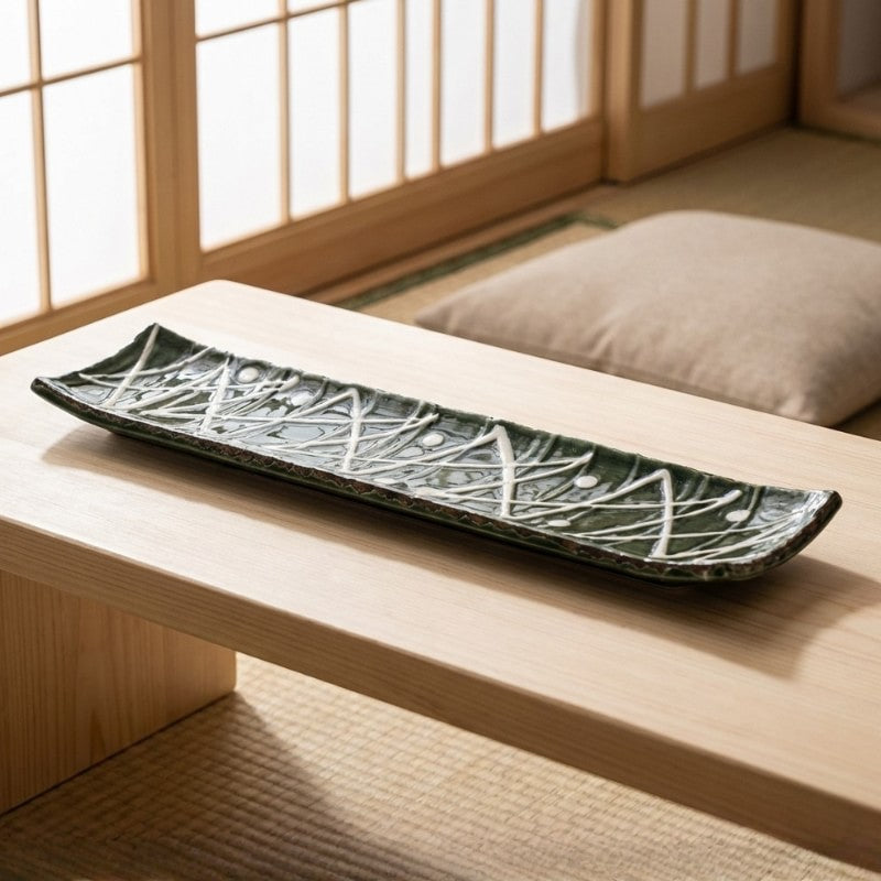 Contemporary plate sushi with angular zigzag motifs displayed on authentic Japanese low dining table