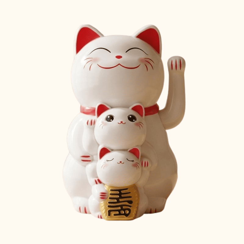 Pristine white solar japanese maneki neko three generation family with red accents and golden treasure on clean background