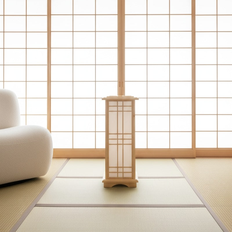 Authentic style japanese lamp with vertical shoji panels centered on tatami mat floor near traditional sliding doors in serene Japanese interior