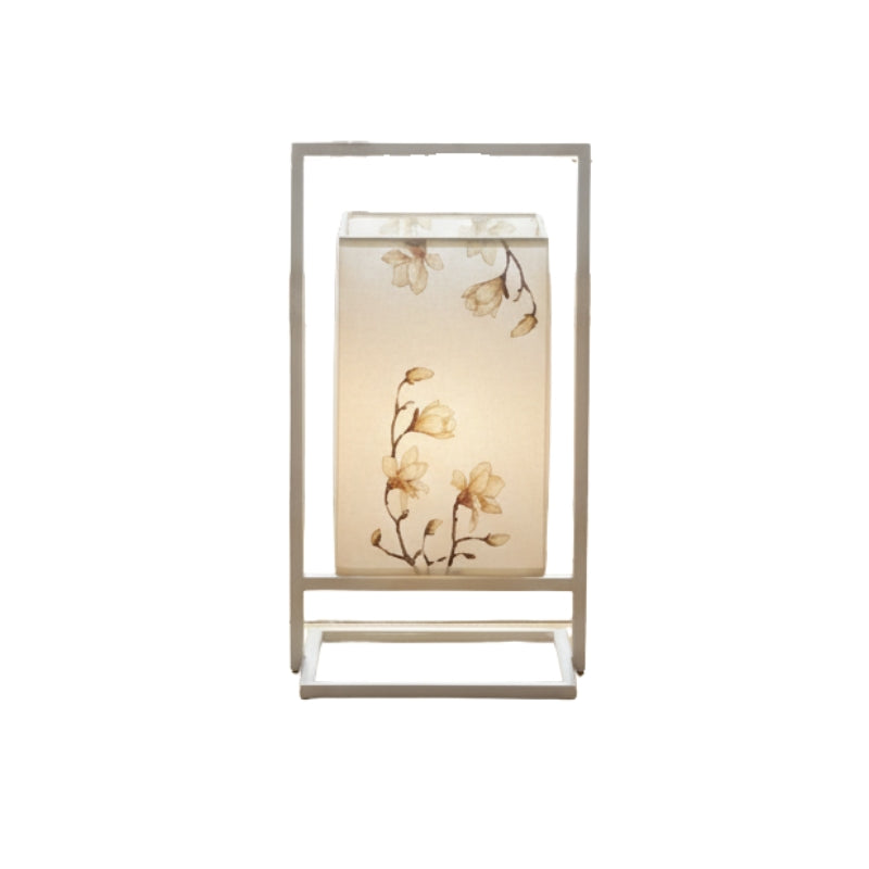 Pure table lamp japanese modern aesthetic with botanical illustration on white cloth shade and minimalist metal structure on neutral background