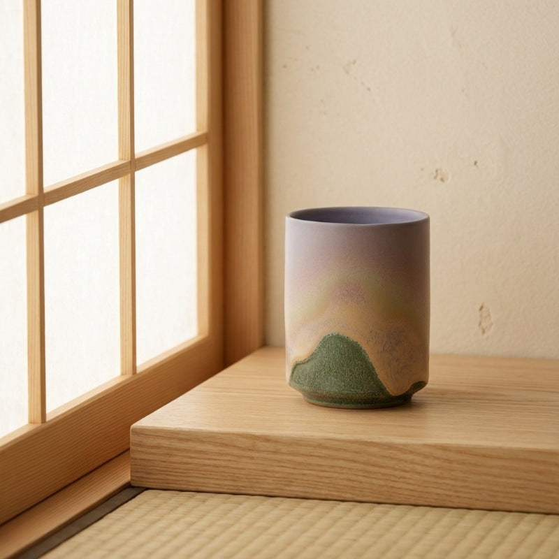 Tea cup set japanese green with landscape gradient near shoji window on wooden platform in serene setting