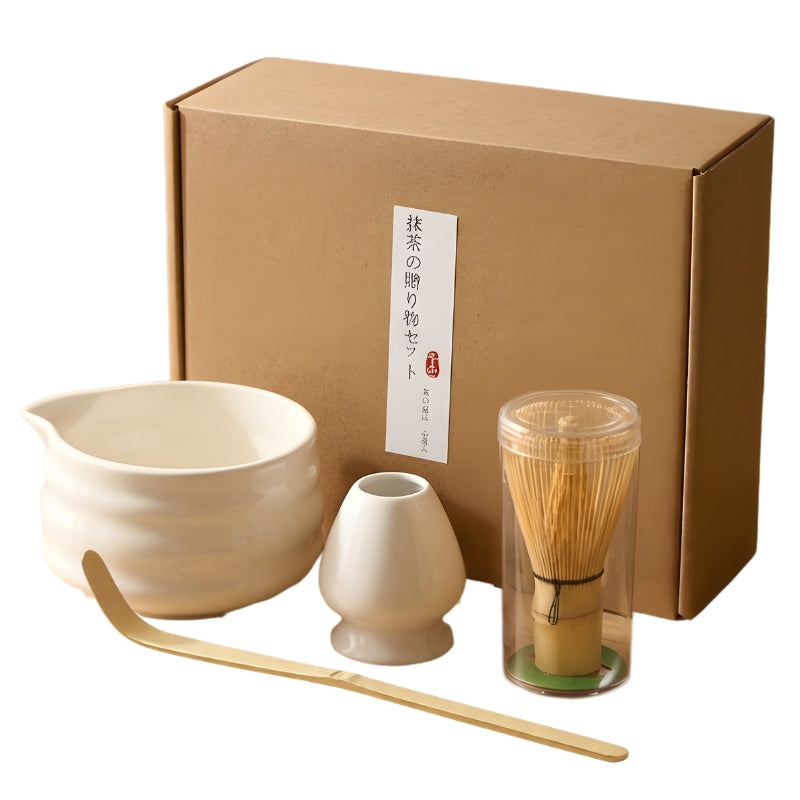 Complete whisk set matcha japanese with white ceramic bowl holder bamboo whisk scoop and kraft packaging on clean white background