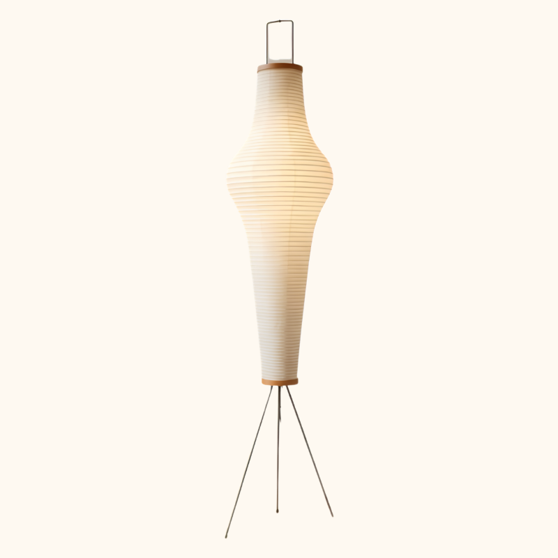 Classic akari paper lamp with tall tapered rice paper shade wooden accents and wire tripod base displayed on clean white background