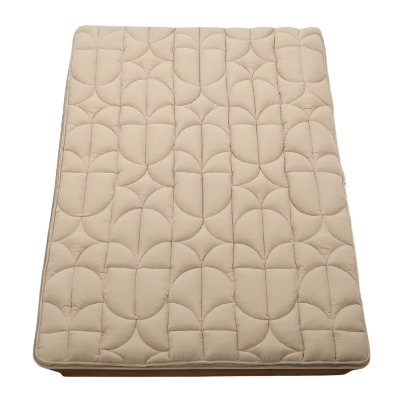 Quilted bed futon japanese in beige color with cloud pattern stitching displayed on clean white background showing traditional craftsmanship