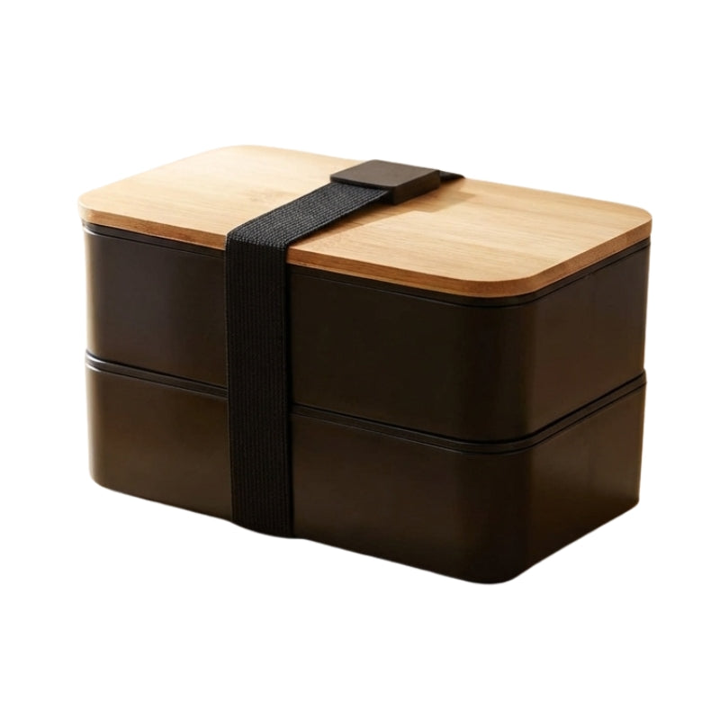 Two-tier dark brown bento box containers japanese style with bamboo lid and black elastic strap on clean white background