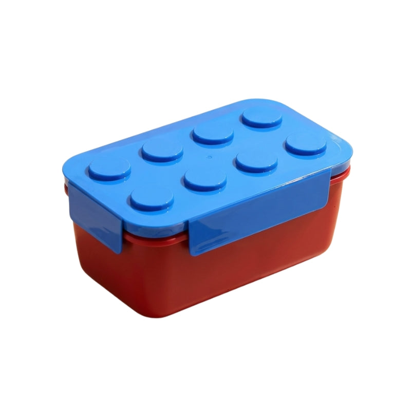 Bright red and blue big bento snack box japanese style with Lego stud pattern lid on clean studio background