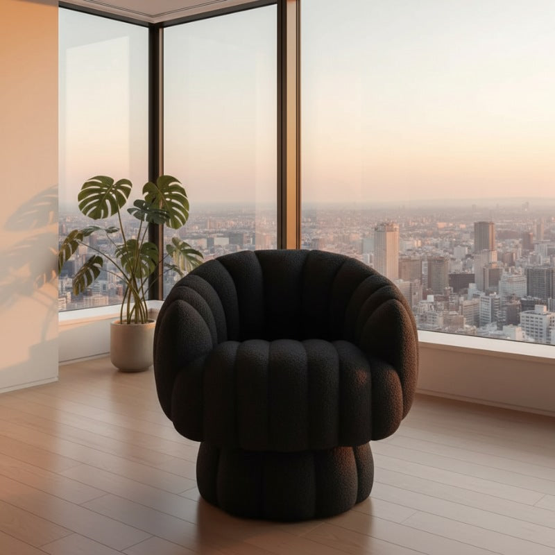 Black sofa floor japanese with sculptural bubble design in modern apartment with panoramic city skyline views at sunset