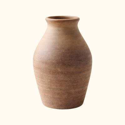 Handcrafted ceramic vase ikebana brown with gradient texture on clean white background