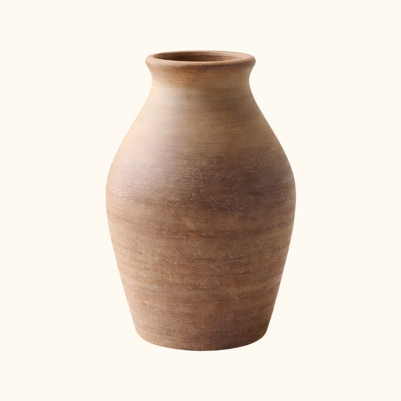 Handcrafted ceramic vase ikebana brown with gradient texture on clean white background