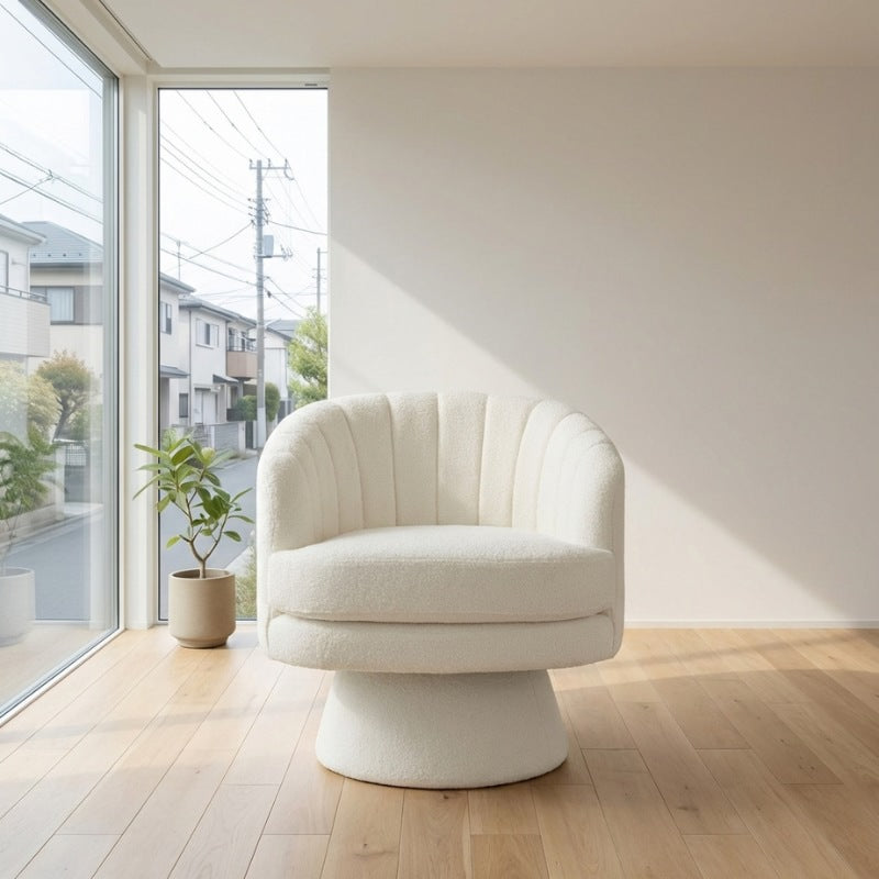 Chair japanese style with cream channel tufted back and swivel pedestal base on light wood flooring near window overlooking residential street