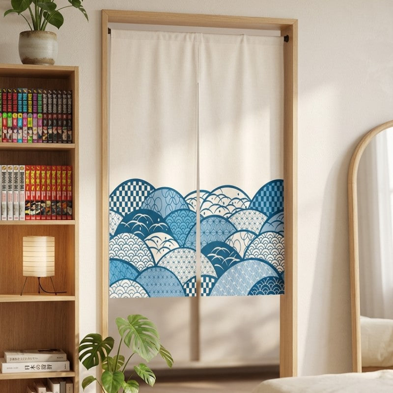 Doorway japanese noren curtain with layered blue seigaiha wave pattern in shades of navy and light blue displayed in modern bedroom with manga bookshelf and round mirror