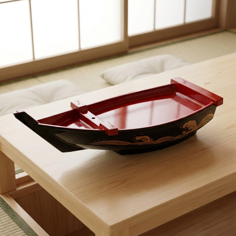 Floating sushi boat black and red curved presentation dish with gold decoration on minimalist low table