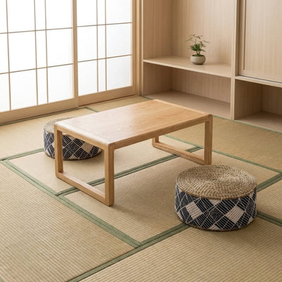 Floor cushion japanese blue zabuton pair with geometric diamond patterns on tatami mats around wooden table in authentic room