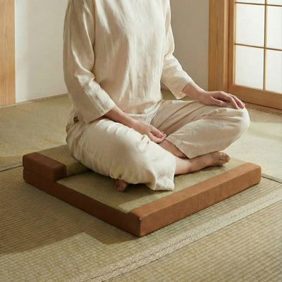 Floor orange cushion japanese with backrest and person meditating in seiza on tatami floor with shoji screen