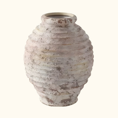 Traditional ikebana vase ceramic with spiral coiled texture and natural beige patina on neutral background