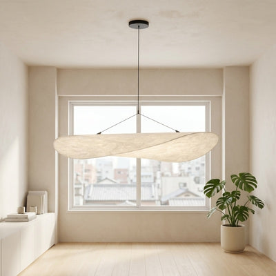 Organic shaped japandi lamp pendant in natural light wood with sculptural curved form on black suspension system