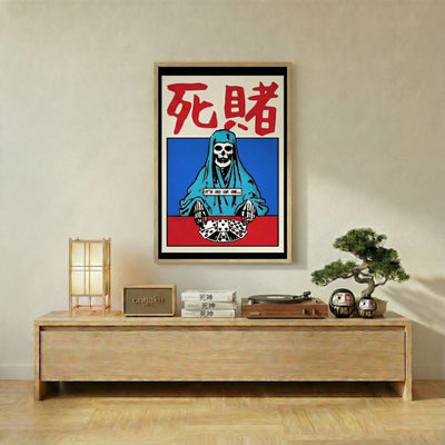 Striking japanese art poster with gambling death motif displayed above wooden console with bamboo lamp bonsai tree and daruma figurines