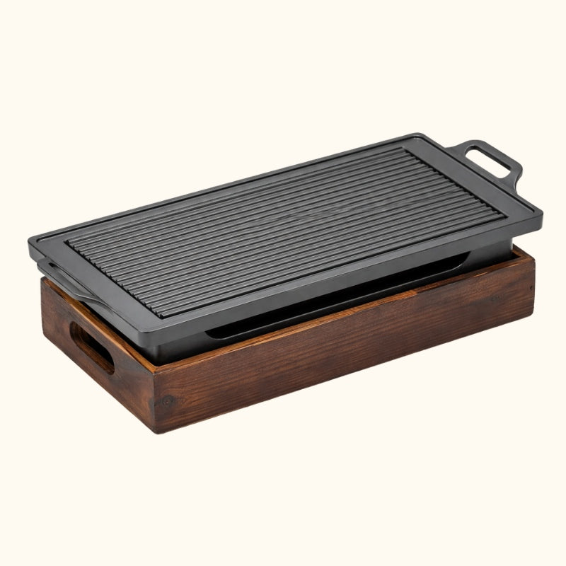 Japanese BBQ grill long rectangular model with ridged cooking surface and dark wood charcoal base shown on white background