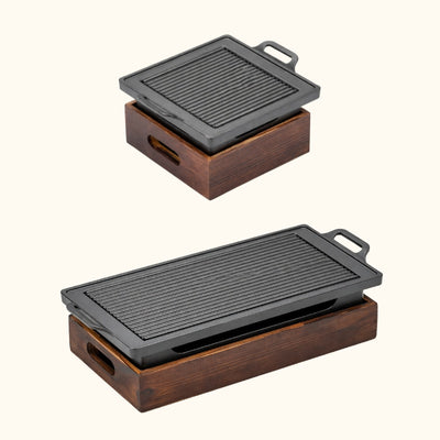 Japanese BBQ grill variants showing square compact model and long rectangular version with identical wood base design