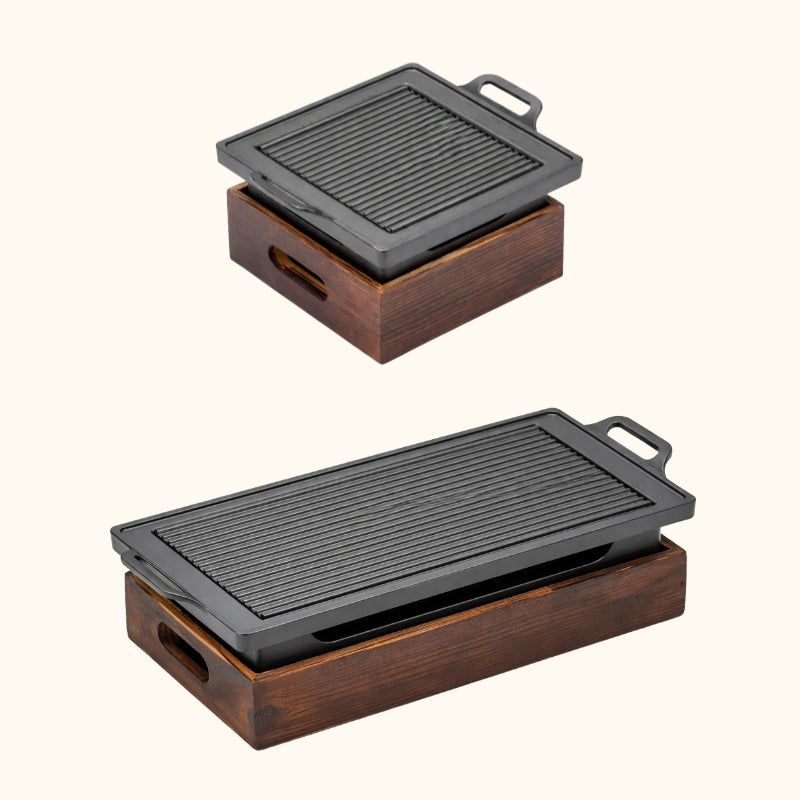 Japanese BBQ grill variants showing square compact model and long rectangular version with identical wood base design