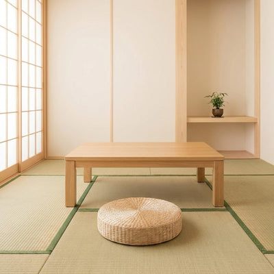 Japanese cushion floor rond in natural woven rattan near wooden table on tatami with shoji screen fusuma and tokonoma