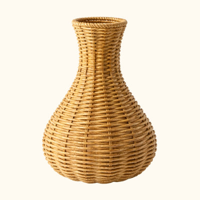 Close-up of a japanese flower hand woven vase showcasing natural rattan texture on a neutral background.