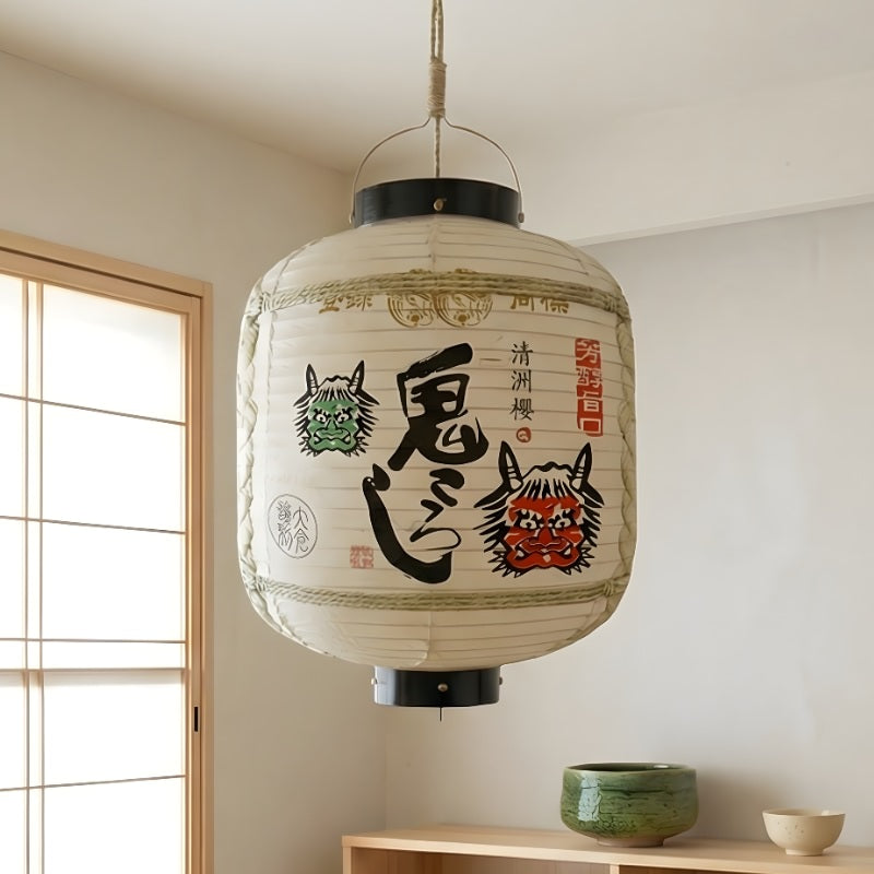 Elegant japanese lantern outdoor with oni masks and traditional calligraphy suspended near shoji window in minimalist contemporary interior with natural daylight
