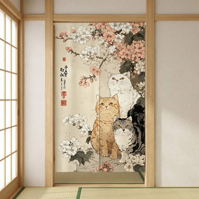 Authentic japanese noren with cats and sakura design hanging in traditional tatami room doorway framed by light wood shoji sliding panels