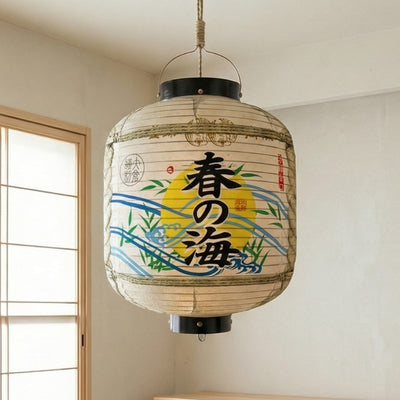 Elegant japanese paper lantern featuring spring sea kanji with bamboo and wave patterns suspended near shoji window in minimalist contemporary interior with natural daylight