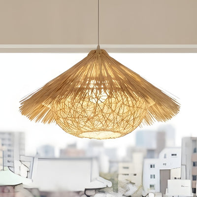 Japanese rattan pendant light illuminated showing cone-shaped woven design with warm glow over urban rooftop cityscape view