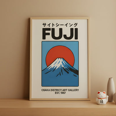 Classic japanese retro poster with Mount Fuji artwork displayed on wooden shelf with maneki neko figurine and ceramic vases in minimalist setting