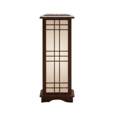 Traditional japanese shoji lamp black with dark wood frame and geometric grid panels displayed on clean white background showcasing elegant craftsmanship