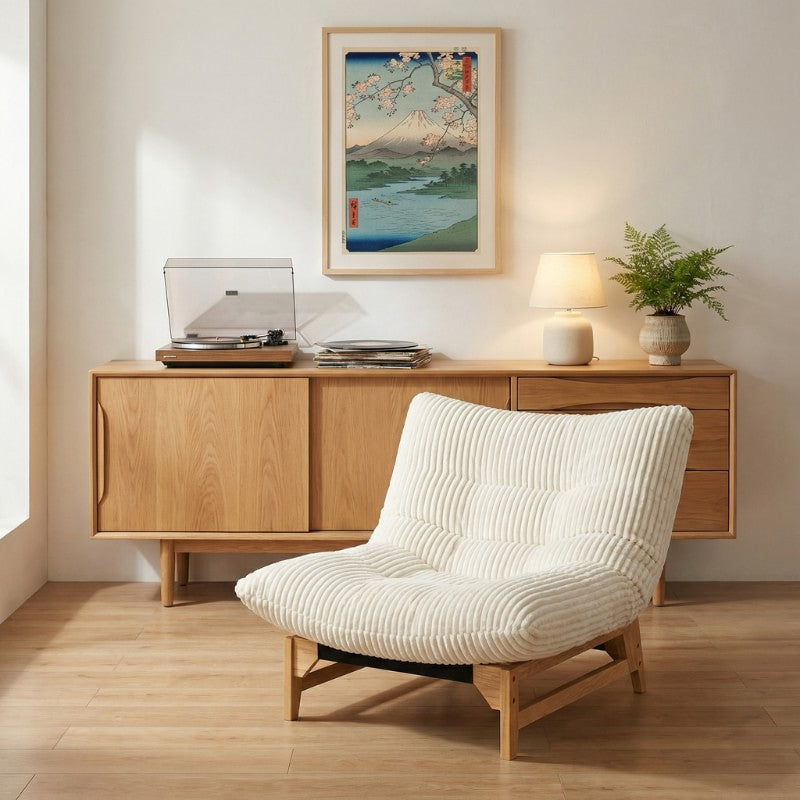 White japanese sofa traditional with corduroy texture beneath Mount Fuji vintage print and mid-century credenza with turntable and ceramic lamp