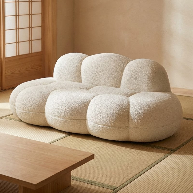 Japanese sofa with cream bubble modules on tatami floor near low wooden table and shoji screen in traditional interior