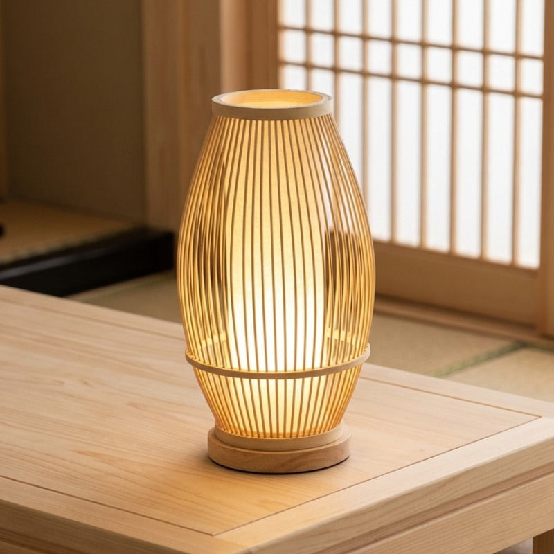 Authentic japanese wood lamp with oval bamboo cage design casting warm amber light in traditional tatami room