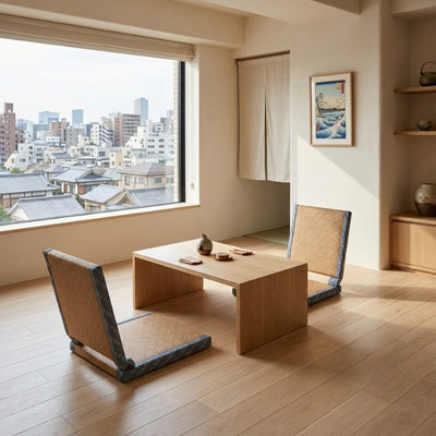 Japanese zaisu chair pair with woven reed pattern around low table in modern room with cityscape view and noren curtain