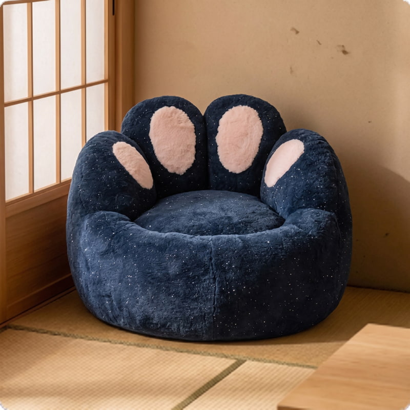 Cozy navy blue kids bean bag chair with plush paw-shaped backrest and pink details beside a traditional Japanese shoji screen.