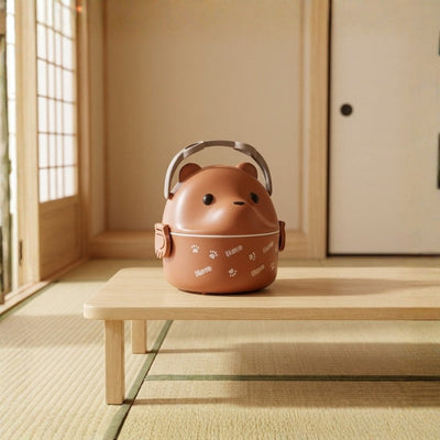 Compact kids bento box japanese brown with secure buckles on wooden surface near tatami and shoji screen
