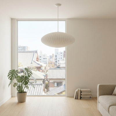 Elegant lamp japandi pendant with ribbed white shade in bright room overlooking traditional japanese temple rooftops